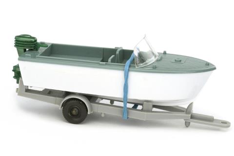 Motorboot auf Anhänger, grünblau